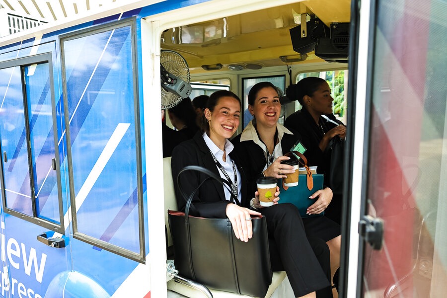 Candidates arriving by shuttle at the Robert L. Crandall Campus